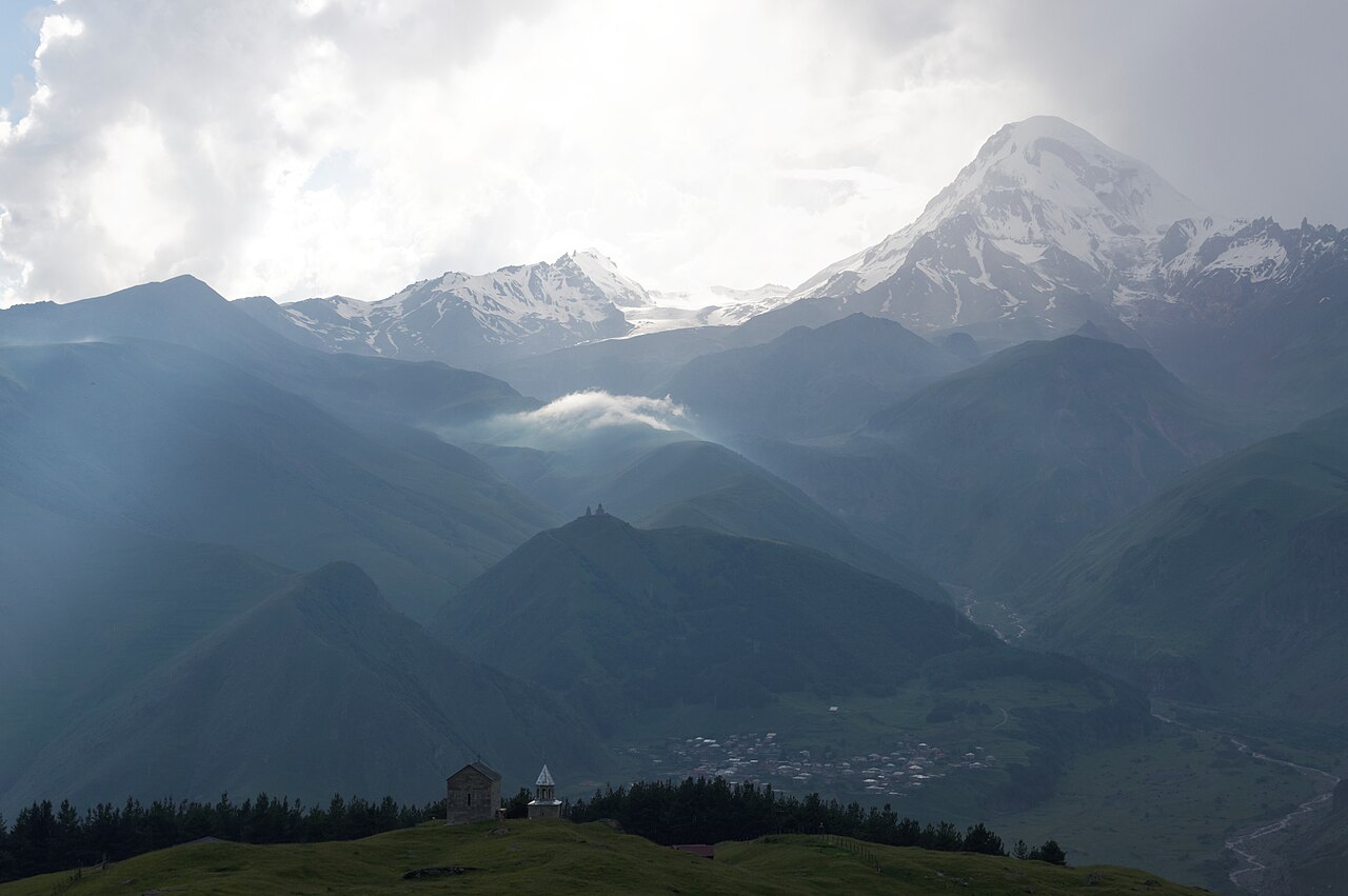 "Kazbegi", Panoramic view of Mount Kazbek (Mqinvartsveri) range, Caucasus, Georgia
