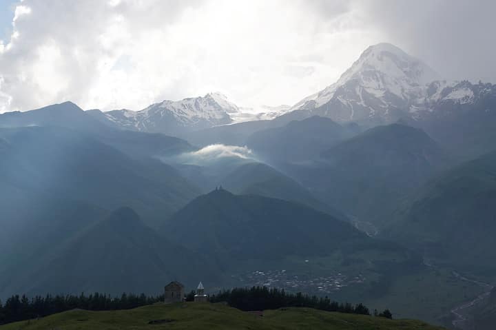 Georgia — "Kazbegi", Panoramic view of Mount Kazbek (Mqinvartsveri) range, Caucasus, Georgia