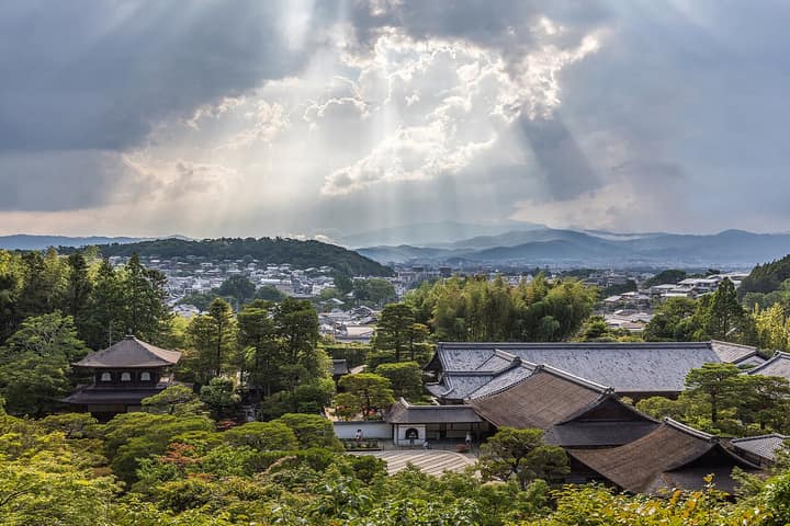 Japan — Sunlight through clouds and view of Ginkaku-ji Temple from above, Kyoto, Japan