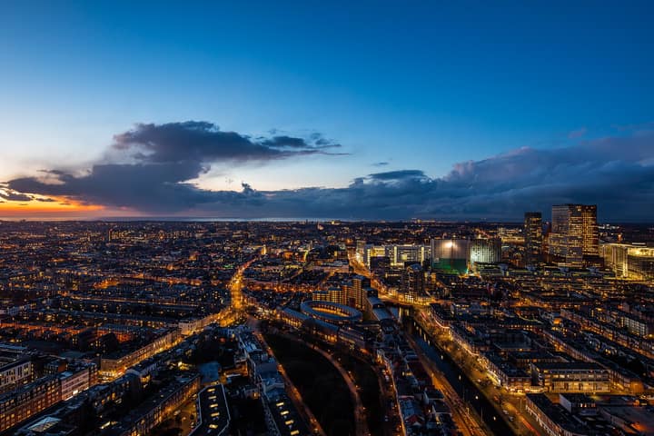 Netherlands — Bright skyline of The Hague (Unsplash)